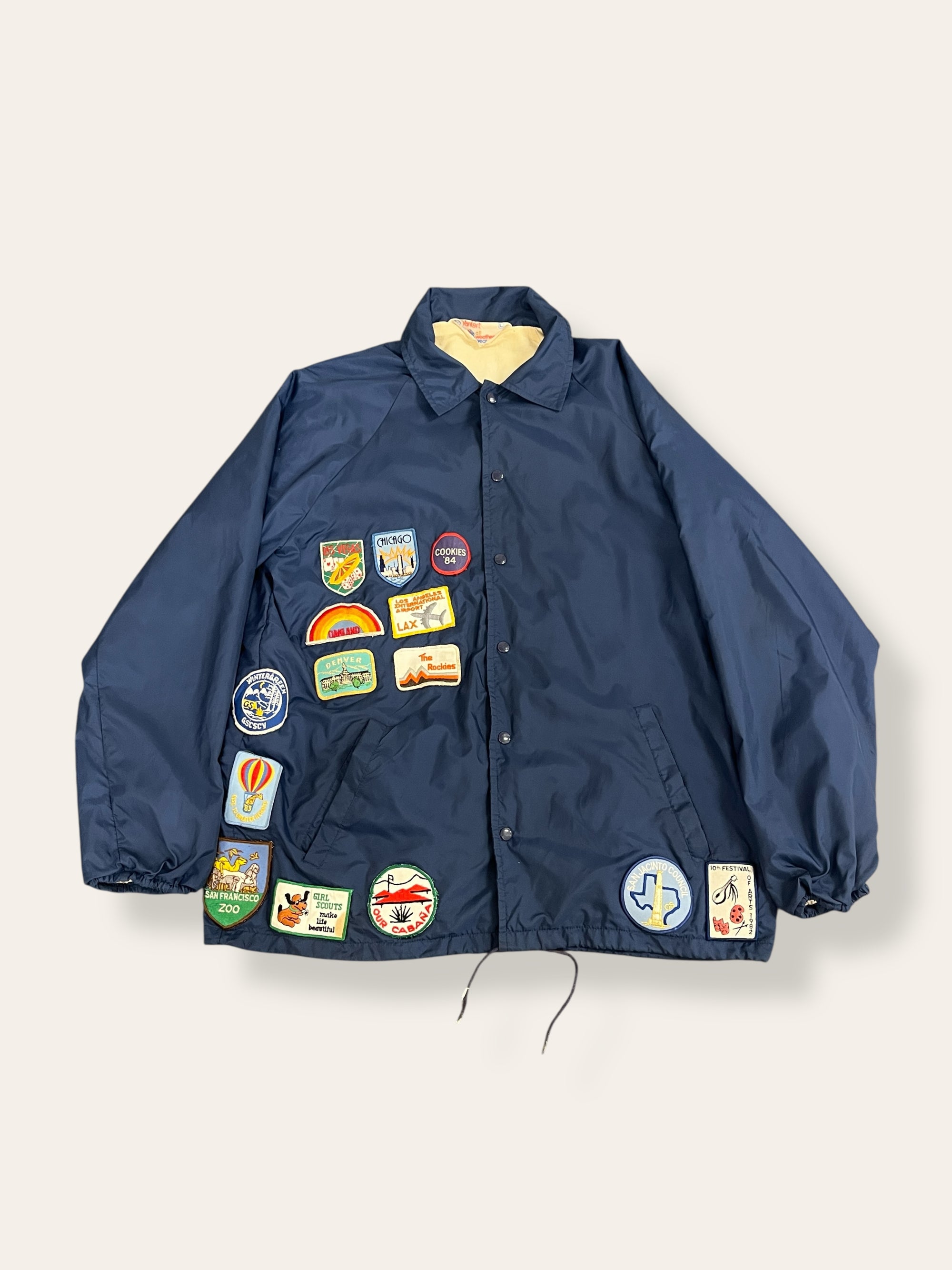 Vintage 1970’s Travel Patched Nylon Jacket