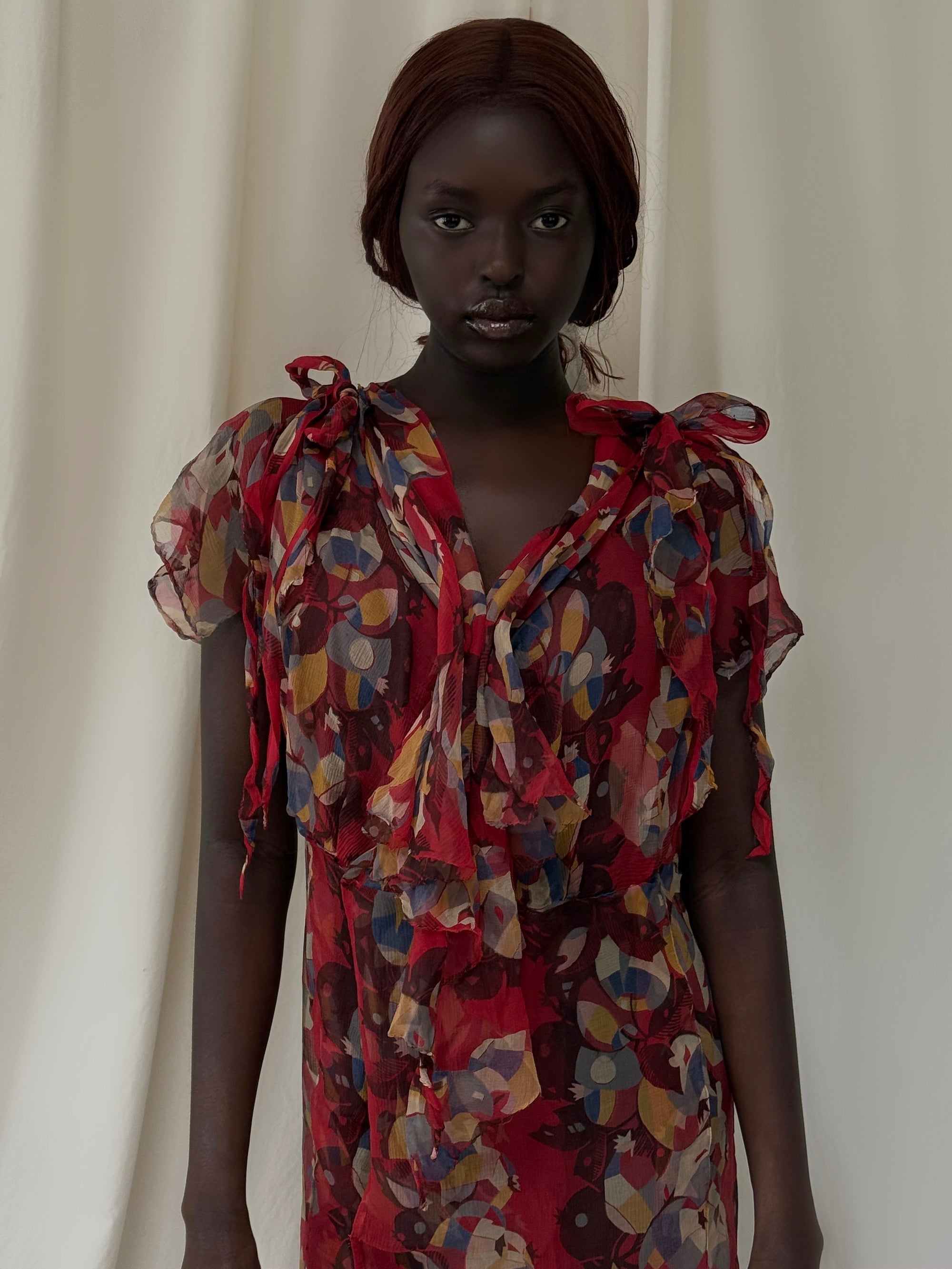 flapper era dress with 1920s sheer chiffon fabric.  high end design with art deco pattern