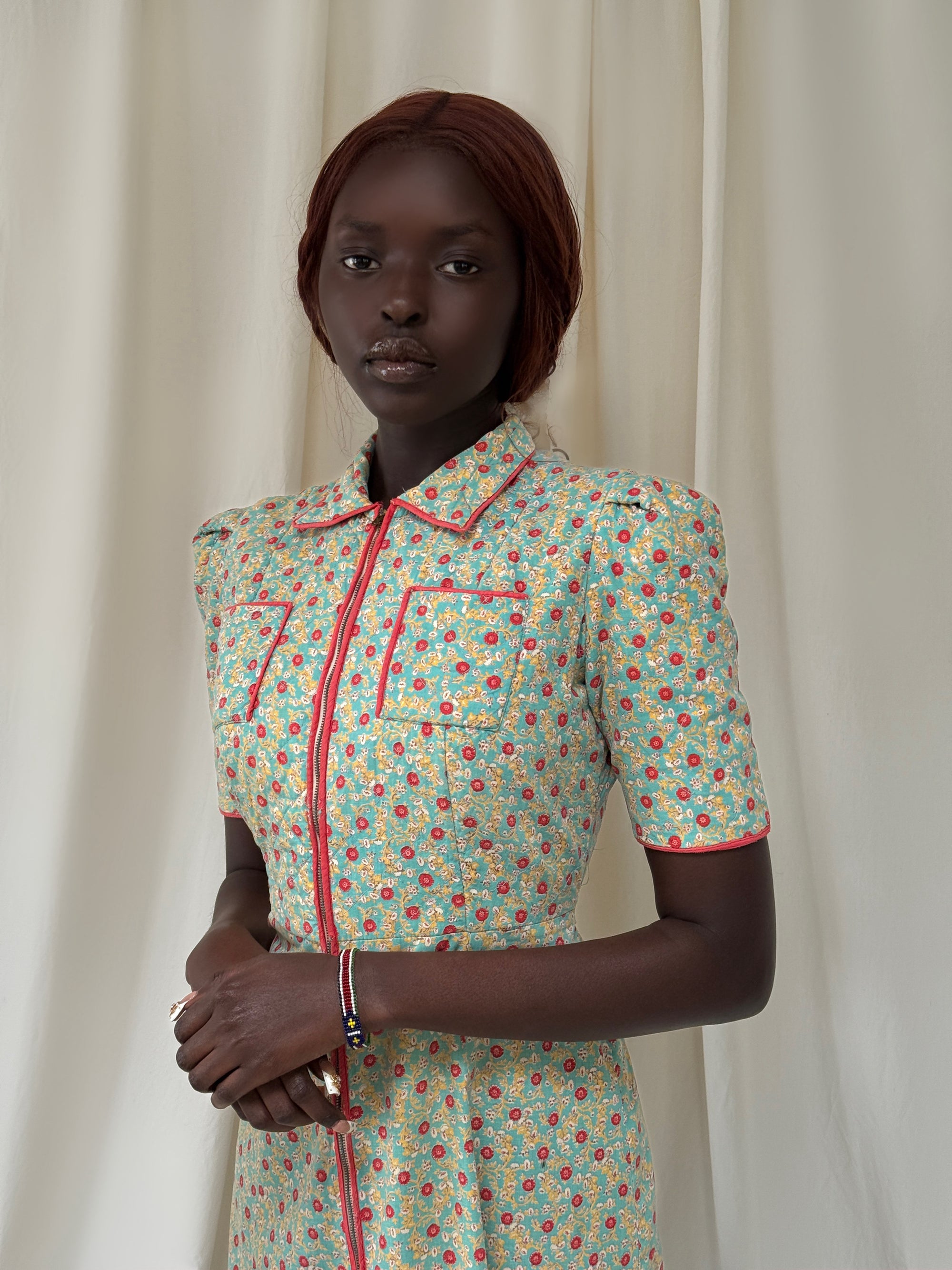 1930s dress with a floral calico pattern quilted top crown zipper