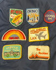 Vintage 1970’s Travel Patched Nylon Jacket
