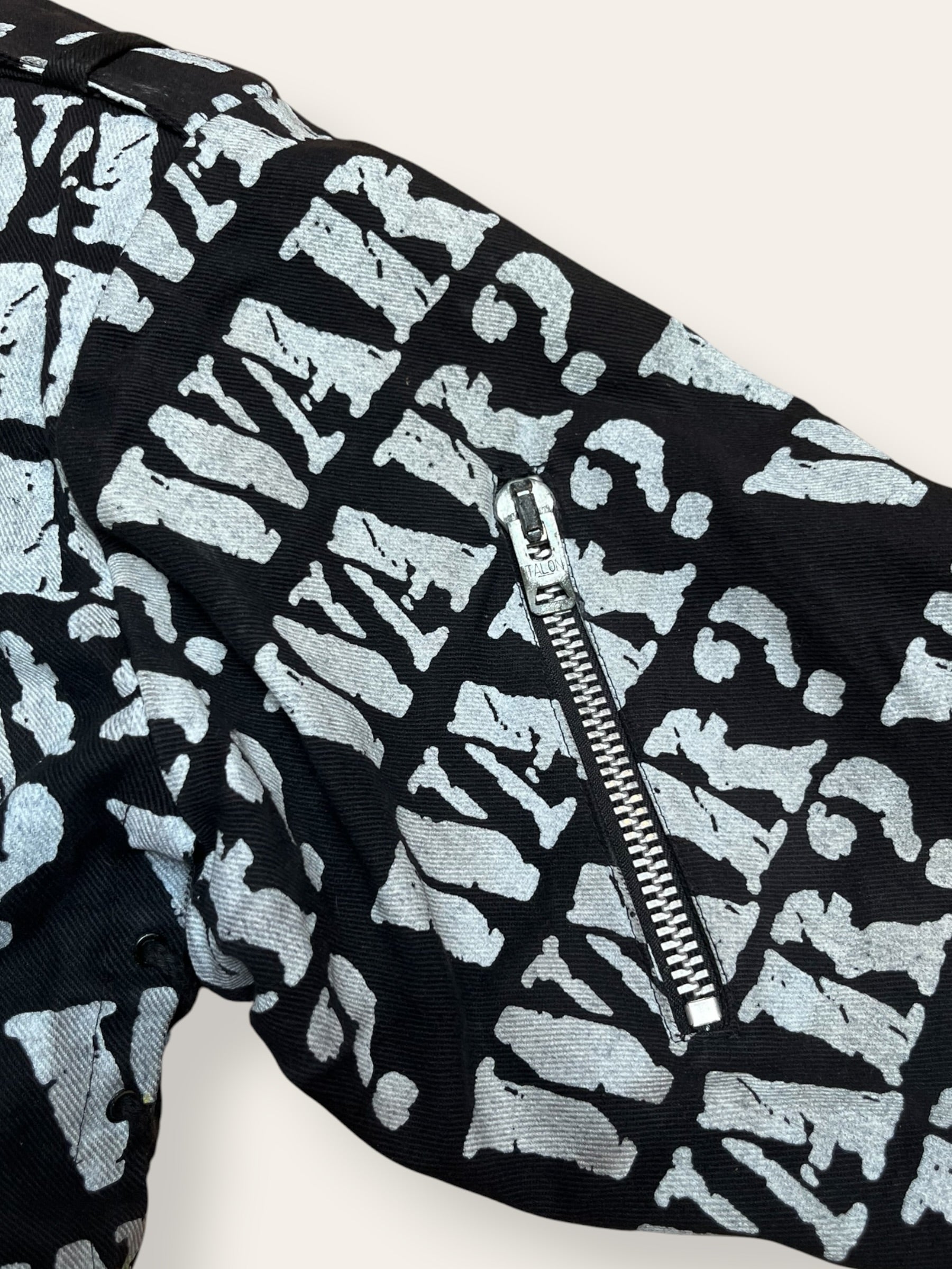 Vintage 1980s Lip Service “War?”Denim Moto Jacket | All Over Print Denim Jacket