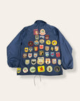 Vintage 1970’s Travel Patched Nylon Jacket
