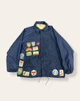 Vintage 1970’s Travel Patched Nylon Jacket