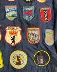Vintage 1970’s Travel Patched Nylon Jacket