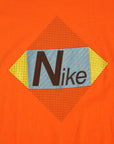 Vintage 1980's Nike Orange Graphic T-Shirt